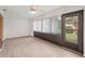Inviting living room with wood-look flooring and natural light, perfect for relaxation and entertaining at 2529 Lancaster Dr, Sun City Center, FL 33573