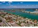 Stunning aerial view of coastal neighborhood, showcasing waterfront views and vibrant community lifestyle at 340 83Rd Ave, St Pete Beach, FL 33706