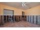 Interior of a room undergoing renovation with exposed framing and tile flooring at 340 83Rd Ave, St Pete Beach, FL 33706