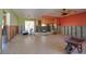 A spacious living space undergoing renovation, with exposed walls and tile flooring at 340 83Rd Ave, St Pete Beach, FL 33706