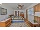 Comfortable bedroom with hardwood floors, natural light, and neutral tones at 3491 58Th N St, St Petersburg, FL 33710