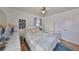 Bright bedroom with hardwood floors, a window, and blue accents at 3491 58Th N St, St Petersburg, FL 33710