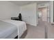 Bright bedroom with a plush bed, modern furnishings, and neutral decor, offering a cozy and inviting space at 35260 Spruce Knob Ct, Dade City, FL 33525