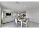 Spacious living space showcasing a modern kitchen, dining area, and comfortable living room at 35260 Spruce Knob Ct, Dade City, FL 33525