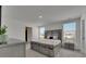 Sunlit main bedroom with neutral decor and stylish furnishings at 35260 Spruce Knob Ct, Dade City, FL 33525
