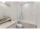 This bathroom features a glass shower with marble accents, unique sink and vanity at 3604 W El Prado Blvd, Tampa, FL 33629