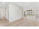 Spacious hallway with wood floors, modern lighting, and railings overlooking the exterior views at 3604 W El Prado Blvd, Tampa, FL 33629