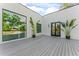 Inviting outdoor space featuring modern design elements and tropical landscaping at 3604 W El Prado Blvd, Tampa, FL 33629