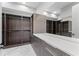 A well-designed walk-in closet boasts custom shelving and ample storage space at 3604 W El Prado Blvd, Tampa, FL 33629
