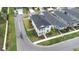 Two-story home with a lush lawn and a fenced yard, located on a corner lot in the neighborhood at 3706 Front Park Dr, Wesley Chapel, FL 33543