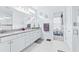 Bright bathroom featuring double vanity sinks and a large mirror at 3706 Front Park Dr, Wesley Chapel, FL 33543
