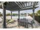 Enjoy a day at the community pool with ample seating and pergola covered tables at 3706 Front Park Dr, Wesley Chapel, FL 33543