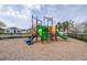Community playground with slides, climbing structures and plenty of room to run and play at 3706 Front Park Dr, Wesley Chapel, FL 33543