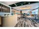 Stylish restaurant with modern decor, comfortable seating, and large screen TVs, ideal for dining and socializing at 40 Gretchen Ct, Oldsmar, FL 34677