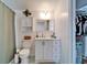 This bathroom has a vanity, toilet, and shower/tub combination, offering functionality and style at 4414 W El Prado Blvd, Tampa, FL 33629