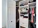Organized walk-in closet features shelving, drawers, and hanging storage at 4414 W El Prado Blvd, Tampa, FL 33629