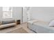 Bright bedroom with a comfortable bed and a window view at 4663 Almada Ln, Wesley Chapel, FL 33543