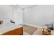 Minimalist bedroom with a comfortable bed, area rug, and a sliding door closet at 4663 Almada Ln, Wesley Chapel, FL 33543