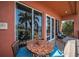 Relax on this balcony with views of the community's grounds; a great spot for enjoying the outdoors at 47 W Morgan St, Tarpon Springs, FL 34689