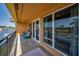 This spacious balcony overlooks a harbor, golf course and the beautiful neighborhood at 47 W Morgan St, Tarpon Springs, FL 34689