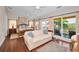 This bedroom features hardwood floors and access to a balcony at 47 W Morgan St, Tarpon Springs, FL 34689