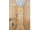 Bathroom shower features a variety of shower heads and tiled surround at 47 W Morgan St, Tarpon Springs, FL 34689