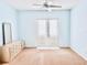 Bedroom featuring neutral tones, closet, ceiling fan and ample space to personalize at 4942 Oldham St, Sarasota, FL 34238