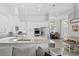 Bright, open kitchen with stainless appliances, granite countertops, and adjacent dining area at 5004 Waterkey Way, Tampa, FL 33647