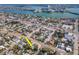 Aerial view of neighborhood with home marked with an arrow, located near the water at 515 77Th Ave, St Pete Beach, FL 33706