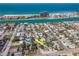 Neighborhood aerial view showcasing a home in a coastal community near the water at 515 77Th Ave, St Pete Beach, FL 33706