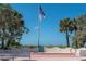 Scenic beachside park with an American flag and a coastal view at 515 77Th Ave, St Pete Beach, FL 33706