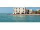 Stunning view of a beachfront condo building right on the water at 515 77Th Ave, St Pete Beach, FL 33706