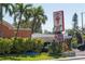 Local donut shop, Larry's, offering 80 flavors with lush green landscaping at 515 77Th Ave, St Pete Beach, FL 33706
