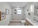 Elegant bathroom featuring a walk-in shower and modern vanity at 5833 Dartmouth N Ave, St Petersburg, FL 33710