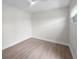 Empty room featuring hard floors, a ceiling fan, natural light, and neutral decor at 5833 Dartmouth N Ave, St Petersburg, FL 33710