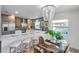Beautiful kitchen with breakfast bar, stainless steel appliances, and stylish decor at 5833 Dartmouth N Ave, St Petersburg, FL 33710