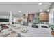Open kitchen boasts a breakfast bar, modern appliances, and stylish backsplash at 5833 Dartmouth N Ave, St Petersburg, FL 33710