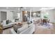 Open living space with an eat-in kitchen, modern decor, and lots of natural light at 5833 Dartmouth N Ave, St Petersburg, FL 33710