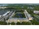 Aerial view of the community showcasing beautiful landscaping, serene lakes, and proximity to the coastline at 5849 Park N St # 308, St Petersburg, FL 33709
