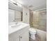 Updated bathroom with shower and bath combination with tub, vanity and modern fixtures at 5849 Park N St # 308, St Petersburg, FL 33709