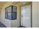 Private front entrance with a window and a white front door at 5849 Park N St # 308, St Petersburg, FL 33709