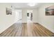 Open-concept living room features new floors, natural light, and seamless transitions at 5849 Park N St # 308, St Petersburg, FL 33709