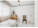 Bright bedroom with tiled floor and closet, offering comfort and functionality at 6544 S West Shore Cir, Tampa, FL 33616