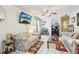 Inviting living room with tile floors, comfortable seating, and bright natural light at 6544 S West Shore Cir, Tampa, FL 33616