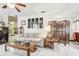 Bright living room with tile floors, decorative screens, and comfortable furnishings at 6544 S West Shore Cir, Tampa, FL 33616