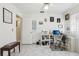 Bright home office setup with desk, shelves, and comfortable chair at 6544 S West Shore Cir, Tampa, FL 33616