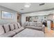 Spacious living room with comfortable seating and neutral colors, creating a relaxing atmosphere at 7110 N Rome Ave, Tampa, FL 33604