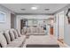 Inviting open concept living room and dining area with ample natural light and neutral decor at 7110 N Rome Ave, Tampa, FL 33604