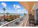 Enjoy amazing water views from this balcony featuring an outdoor dining set at 7430 Sunshine Skyway S Ln # 402, St Petersburg, FL 33711
