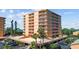 Exterior view of the condo building featuring multiple floors and balconies with water views at 7430 Sunshine Skyway S Ln # 402, St Petersburg, FL 33711